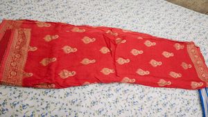 Beautiful Red Saree With Stiched Blouse.