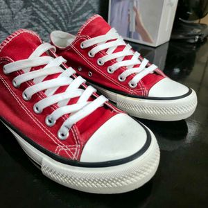 Red Low-Top Canvas Sneakers.