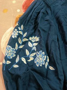 Blue Top With Tag