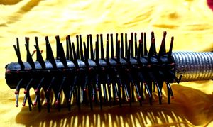 Two Combs With Silver Coating