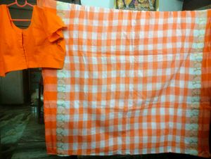 Orange Saree With Matching Blouse.