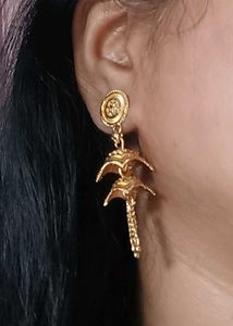 Gold Jhumka Earrings