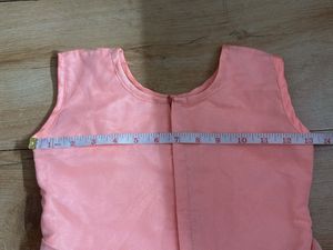 Peach Color Gown In Net For Girls