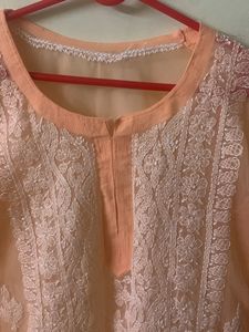 Peachy Orange Transparent Chikankari Kurti With inner