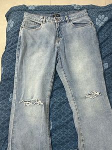 Ripped Flare Jeans