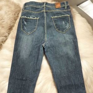 Distressed Denim Jeans