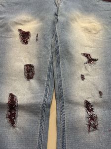 Ripped Light Wash Jeans