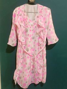 PINK BUBBLE PRINT MIDI DRESS WITH RUFFLES AND BELL SLEEVED. SIZE M