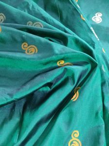 Green kanchipuram silk saree.