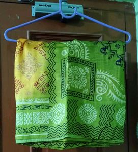 Mustard Yellow Tribal print Saree with Olive Green