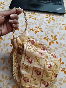 Ethenic Gold Coloured Potli Bag