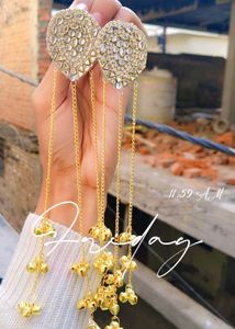 Gold Jhumka Earrings