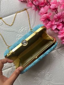 Sky blue chikankari clutch with sling belt