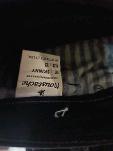 A Black Cotton With Lycra Jeans