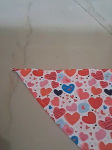 A HEART TRIANGLE SHAPED NAPKIN