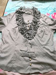 Fancy Top With Ruffle Neck Detailing Nd Buttons