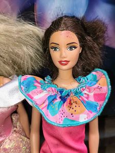 Two Barbie Dolls