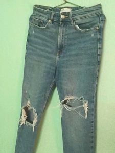 Ripped Knee Denim Jeans