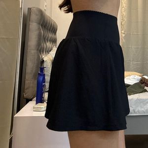 Black skirt with shorts underneath