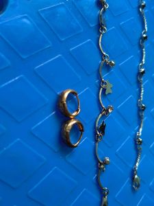 Two anklets and a pair of earings