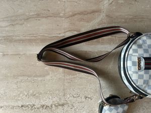 Gucci white sling bag