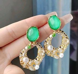 Geometric Earrings With Silver Beads