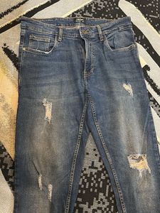 Distressed Denim Jeans
