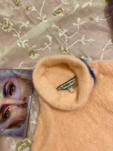 Turtle Neck Furry Sweater With Huge Bell Sleeves