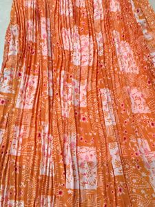 Pleated Orange Skirt