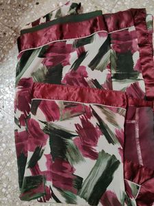 maroon and green saree