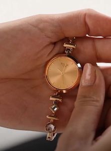 Titan Raga-Elegant Rose Gold Beaded Watch