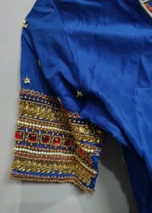 Orange &amp; Gold Lehenga Choli with Maggam work