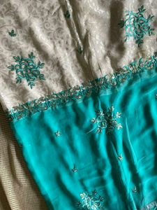 Half Green And White Saree With Stitched Blouse