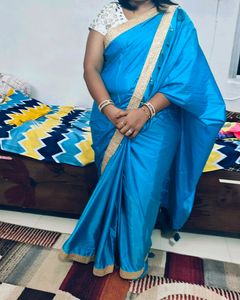 Light Firozi Saree With Golden Border