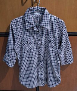 Stylish women’s checkered shirt