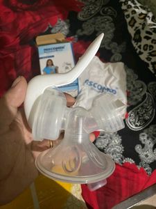 Breast Pump Which Can Fit To Any Feeding Bottle...