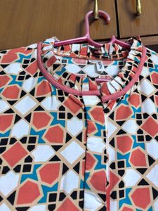 “Yufta” Vibrant Orange Geometric Dress