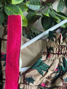LABEL AYUSHI SHAH BONNING PANTS AND GREEN TOP