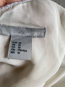 H&amp;M Ivory Sleeveless Top – Size 38