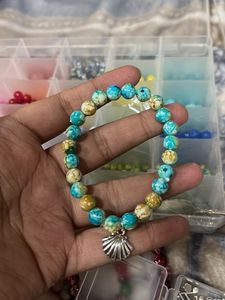 blue Beaded Bracelet with Shell Charm