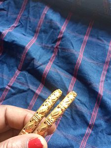 Elegant Gold Tone Bangles - Set of Two