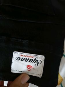 It Is Black Jeans With Tag And Solid  Colour