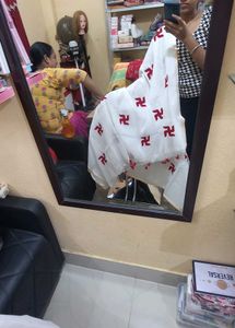 White And Red Swastik Print Saree