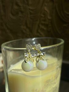 Pearl Drop Earrings with Bow Detail