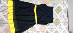 it is black top up to kness with yellow cloth belt and it didnt used one time also