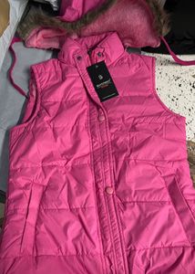 Brand new pink sleeveless jacket with hoodie