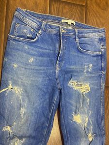 Distressed Denim Jeans