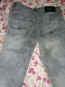 Distressed Gray Denim Jeans