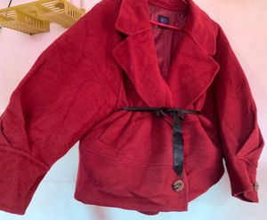 Red belted coat