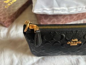 Coach Nolita - Black Engraved Shoulder Bag